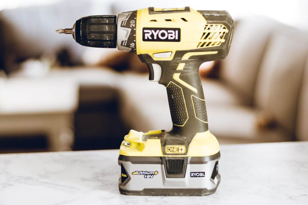 A Ryobi drill to illustrate a brushed tool in the what does brushless mean blog post.